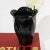Vintage 1980s ceramic flower vase by Haeger. This stunning vase features Haeger's iconic glossy glaze in black. Perfect...