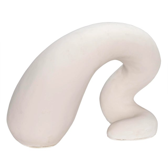 Formed of fiber cement, which has a rich, natural texture that invites exploration, this sculpture, with its curvy...