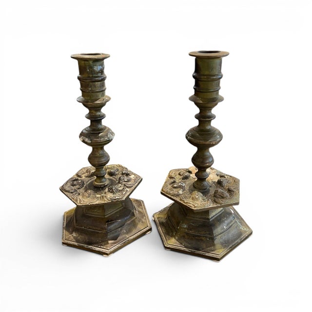 This impressive pair of 19th century Belgian candlesticks is crafted from heavy bronze and showcases exceptional...