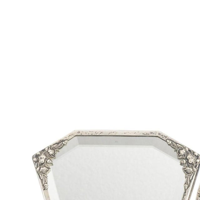 Silver - Three silver mirrors. Portuguese from the early 20th century, stamped silver with embossed decoration, one hand...