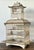 This vintage Chinoiserie-style metal birdcage is a captivating decorative piece, distinguished by its elegant pagoda-...