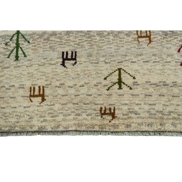 Hand-Knotted Gabbeh Nomadic Rug with Natural Tones & Symbolism For Sale - Image 6 of 11