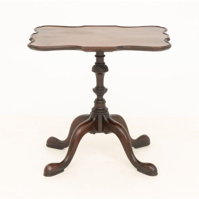 Queen Anne Style Mahogany Pie Crust Top Tea Table, on pedestal base with four cabriole feet. 21.75" H x 23.5" W x 16.5" D....