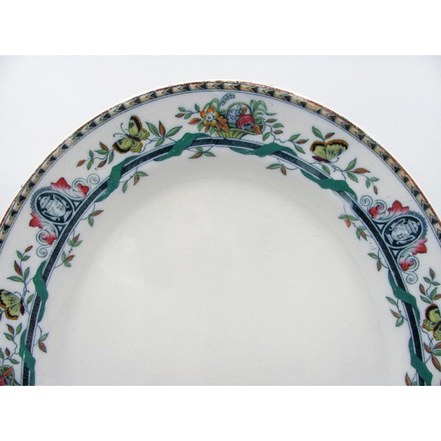 Manufactured sometime between 1862–1876, this thick and sturdy, show-stopping antique platter showcasing butterflies, urns...