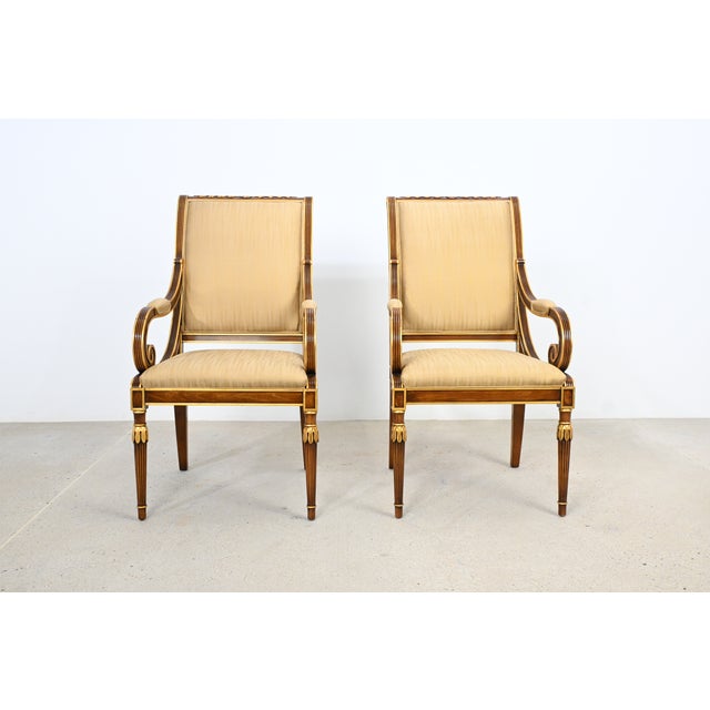 This sophisticated pair of Karges dining chairs showcases refined Louis XVI and Neoclassical styling with gracefully...