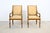 This sophisticated pair of Karges dining chairs showcases refined Louis XVI and Neoclassical styling with gracefully...