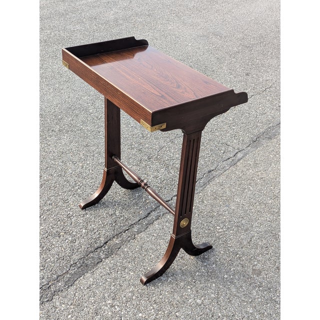 This exquisite vintage Ethan Allen 20th-century French-inspired mahogany occasional side table is a masterclass in...