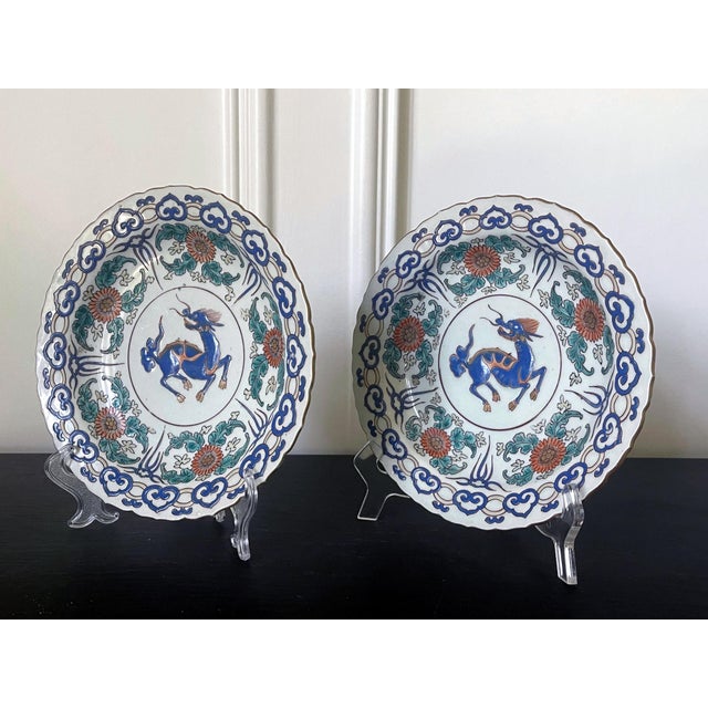 A pair of Japanese decorative ceramic plates, made in Arita for export market circa 17-18th century. The cabinet-display...