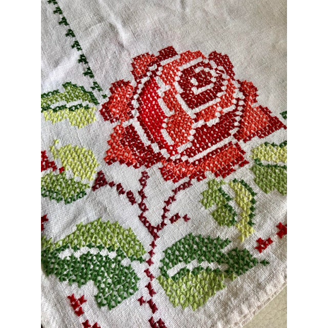 Antique French natural linen hand embroidered in cross stitch with red and green floral motif. Excellent condition no...