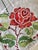 Antique French natural linen hand embroidered in cross stitch with red and green floral motif. Excellent condition no...