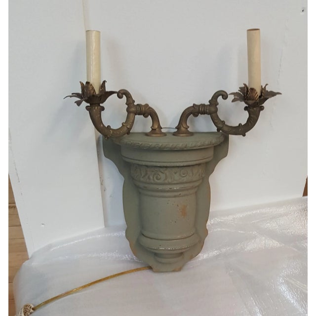 Showroom Sample Sconce Candelabra. Electrical with rustic design. By Guild Master. Grayish Greenish color.