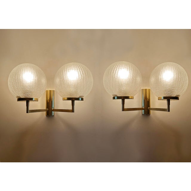 Pair of Vintage double sconces, 1960s, brass structure with shattered glass effect globe shades Dimensions: Height 22 cm /...