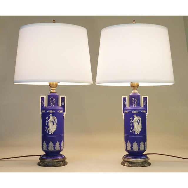 A striking matching set of rare Cobalt colored highly stylized and decorated Wedgewood "Jasperware" style Porcelain...