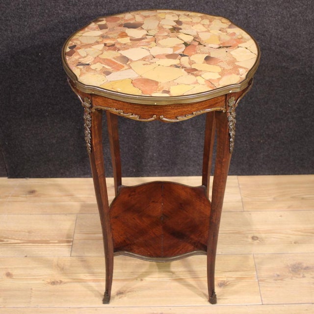 Mid-20th-century French side table. Napoleon III-style furniture, carved and veneered in mahogany, walnut, and beech, with...