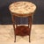 Mid-20th-century French side table. Napoleon III-style furniture, carved and veneered in mahogany, walnut, and beech, with...
