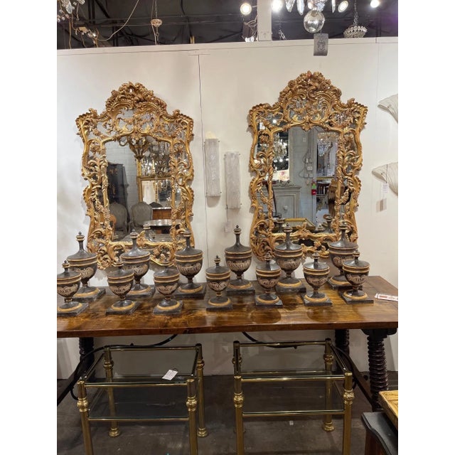 Gorgeous pair of Italian carved and giltwood mirrors. Very fine ornate carvings on these. A fabulous decorative element...