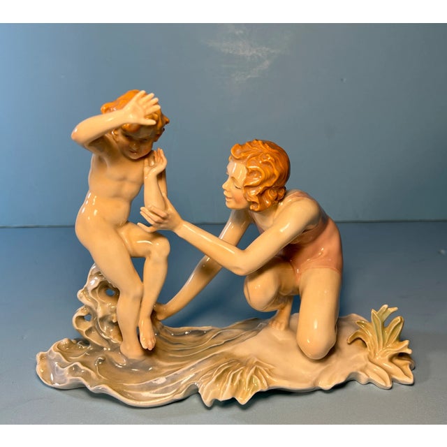 This charming porcelain figurine, skillfully crafted by the renowned Karl Ens Porcelain Company in Germany, beautifully...