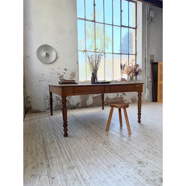 Antique large table made entirely of solid oak from the 1950s, in the style of a large conference table. we love its...