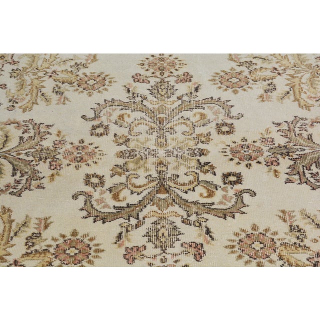 Hand-knotted with care using traditional rug-making techniques, this wool rug blends timeless craftsmanship with a modern...