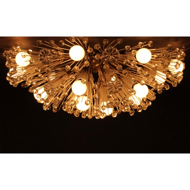 This giant half sphere ceiling or wall lamp was designed by emil stejnar in the 1950s and manufactured by rupert nikoll....