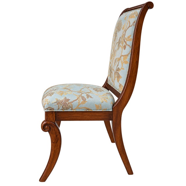 Elegant set of four French Regency–inspired dining chairs dating to circa 2010. The chairs feature tall fully upholstered...