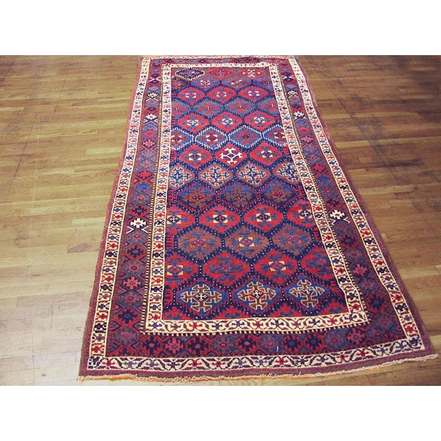 Antique Persian Kurdish rug, size: 4'2" x 9'9". Antique Kurdish Persian 1900s Rug, Country of Origin: Persia, Circa Date:...