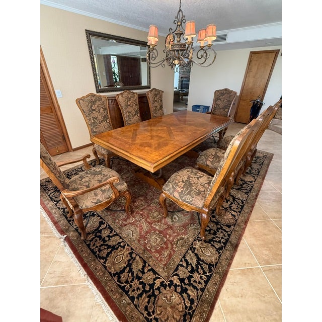 Provenance & Condition Offered by the original owner, this heirloom-quality 9-piece dining collection is an absolute...