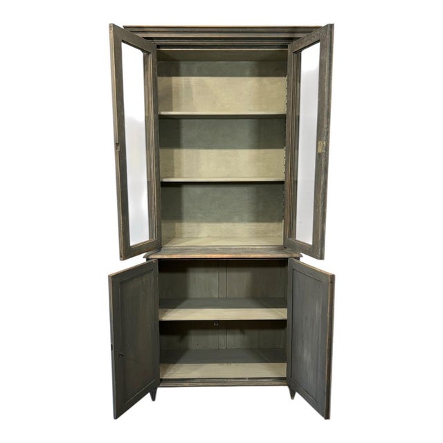 Elevated in scale and presence, this exquisite tall Swedish display cabinet dates to the late 19th century and showcases...