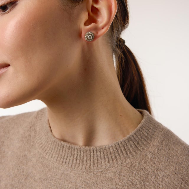 A radiant pair of turn-of-the-century treasures, these Victorian cluster earrings showcase two luminous old European cut...