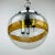 The rare hand-blown Murano glass pendant lamp made in Italy in the 1970s. A transparent glass shade with a "Pulegoso"...
