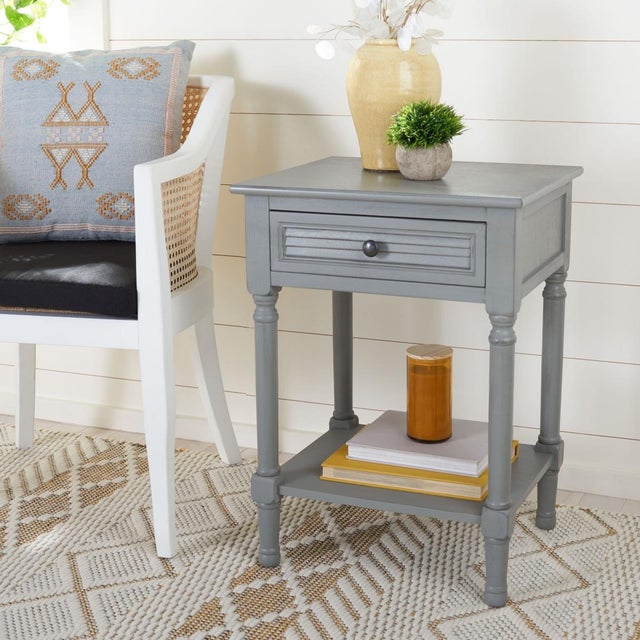 Give your classic contemporary decor a timeless touch of tradition with this Tate Accent Table. Tate's finely sculpted...