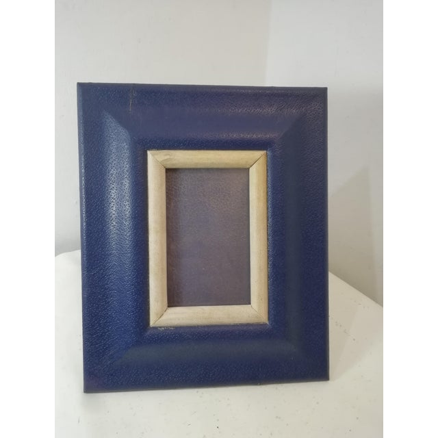 Tabletop photo frame with a wide parchment border. This original vintage piece is designed by Aldo Tura. Photo space...