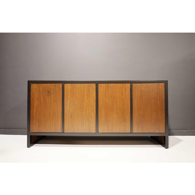 This is a beautifully restored sideboard by Edward Wormley for Dunbar, a rare model that epitomizes mid-century modern...