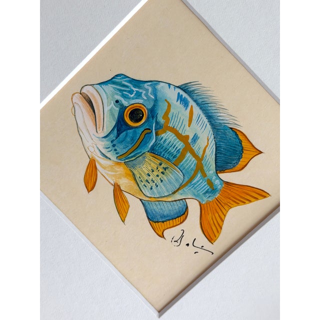 This vibrant fish is hand-painted by master artists using acrylic paints and natural pigments, with extraordinary...