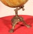 Exquisite terrestrial globe, made by Lebègue & Cie, Brussels. A very beautiful model with a superb cast iron base...