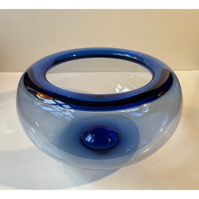 Large Handblown blue tinted clear centerpiece glass bowl designed by Per Lütken in 1955. This piece was made at Holmegaard...