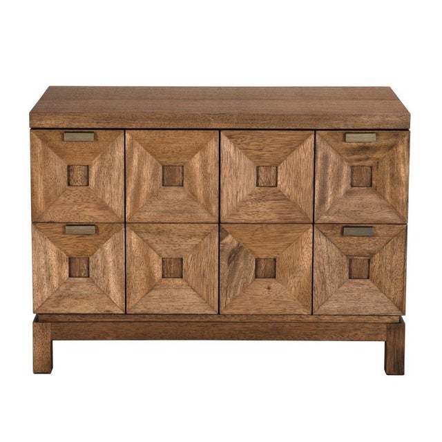 This two-drawer cabinet in Dark Walnut features six faceted, pyramidal drawer fronts that add sculptural depth and...