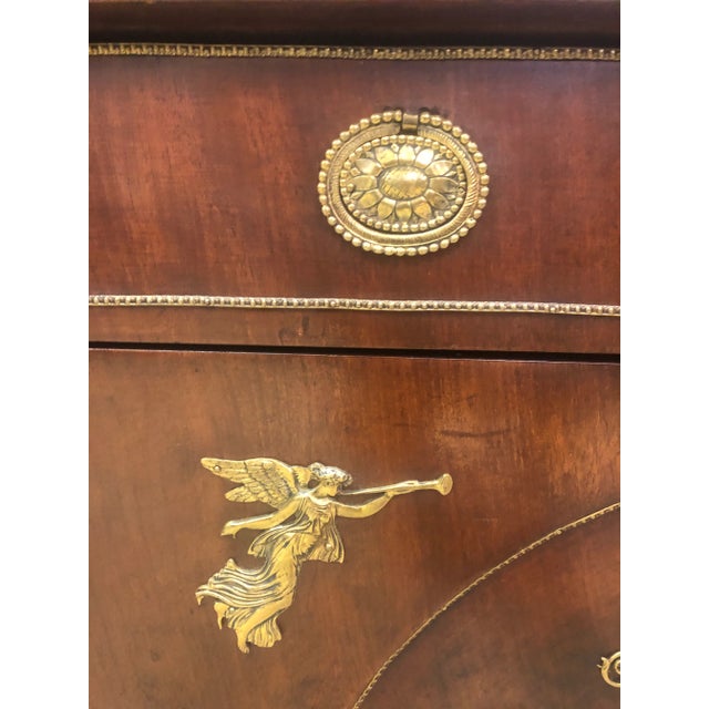 Circa 1875 French Empire 3-drawer commode with ormolu mounts. Key included.