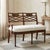 A handsome vintage double-chair-back settee in the Regency Revival taste, featuring a warm mahogany-tone wood frame,...