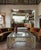 A commanding and structurally striking example of 1970s Hollywood Regency design, this oversized square cocktail table...