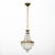 An elegant French crystal chandelier, circa 1920, designed in the refined Louis XVI tradition. The chandelier features a...