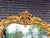 A striking 1970s Italian Baroque Rococo-style wall mirror, handcrafted from solid beechwood and finished in a warm antique...