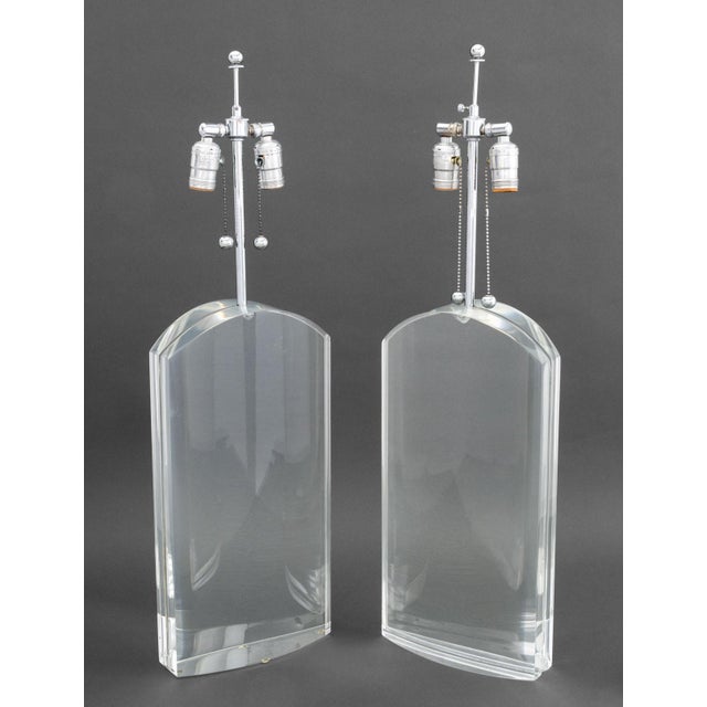 Pair of Modern Clear Acrylic and Chrome Table Lamps, one with cube form finial. Taller: 31.5" H x 9" W x 4" D. Provenance:...