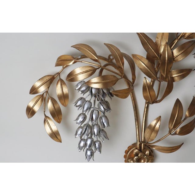 This beautiful large wall light is the epitome of luxury and enchants with its timeless elegance, captivating the viewer....