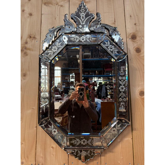 Classical style Venetian mirror, Napoleon III period, in engraved glass and wood. Octagonal structure with a frame...