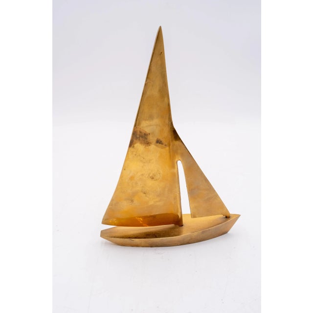 Age: Approx 30 years old Details: Pair of heavy brass beach décor. unmarked. Listed dimensions are for larger item. Small...