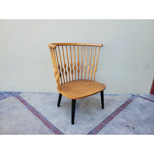 Vintage beech Throne Chair design by Patricia Urquiola for Andreu World and made in Spain. The chair is meant to resemble...