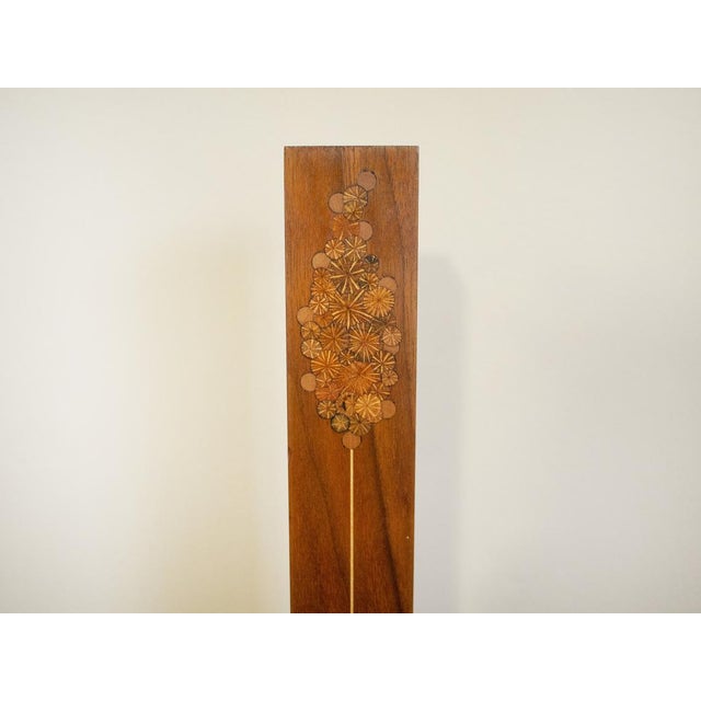 Very cool wall hanging pocket vase by woodworker Roger Sloan. Very neat inlaid design on the front side of the vase....