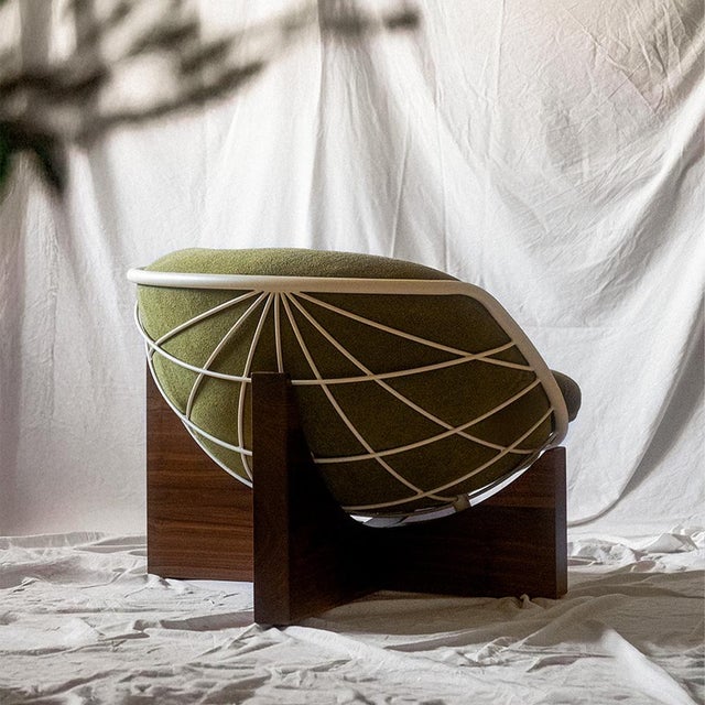 Material: Solid Canaletto Walnut, Iron, and Fabric. Origin: Made in Italy, specifically in Puglia by local artisans....