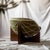 Material: Solid Canaletto Walnut, Iron, and Fabric. Origin: Made in Italy, specifically in Puglia by local artisans....